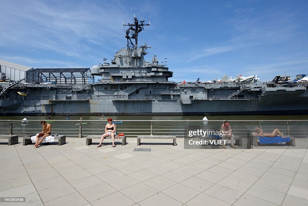 Intrepid Sea, Air & Space Museum with sunbathing people