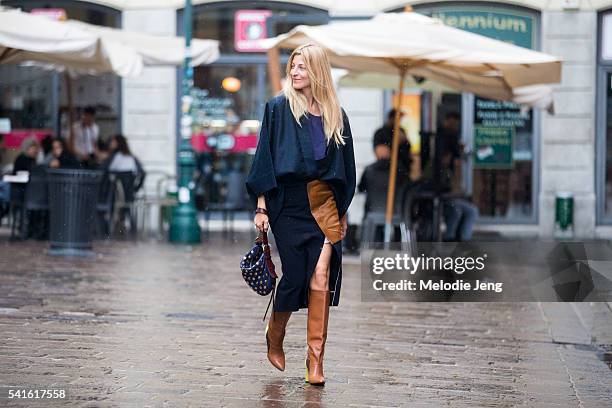 Ada Kokosar wears a navy and brown suede Chadwick Bell assymetrical skirt at Missoni during the Milan Men's Fashion Week Spring/Summer 2017 on June...