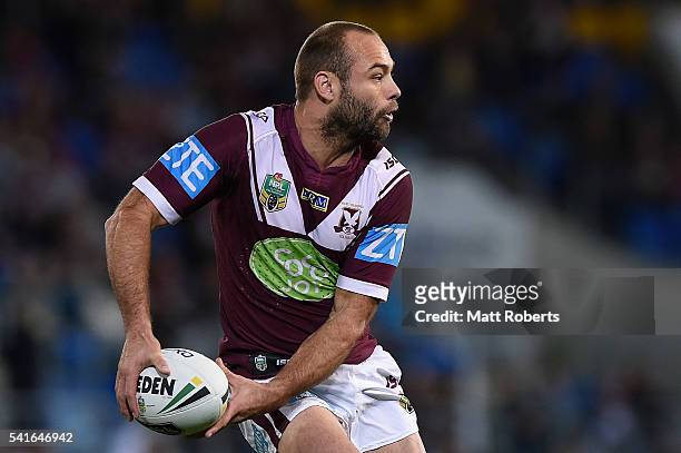 Brett Stewart of the Sea Eagles passes the ball during the round 15 NRL match between the Gold Coast Titans and the Manly Sea Eagles at Cbus Super...