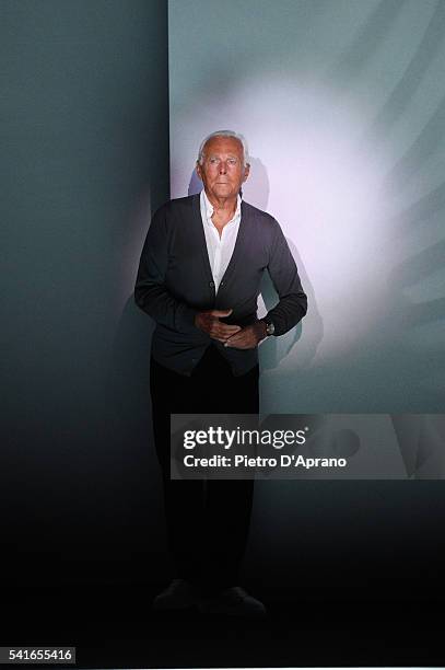 Designer Giorgio Armani acknowledges the applause of the audience after the Emporio Armani show during Milan Men's Fashion Week Spring/Summer 2017 on...