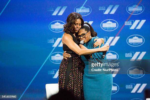 Washington, DC On Tuesday, June 14, at the Walter E. Washington Convention Center, l-r, First Lady Michelle Obama, and Oprah Winfrey, share a hug,...