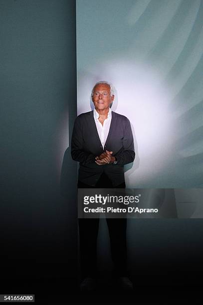 Designer Giorgio Armani acknowledges the applause of the audience after the Emporio Armani show during Milan Men's Fashion Week Spring/Summer 2017 on...