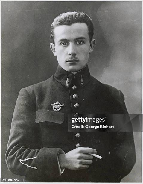 Lieutenant Coste is France's Latest Hero of the Air. Photo shows: Latest posed pictured of Lieutenant Coste, famous French aviator, whose long flight...