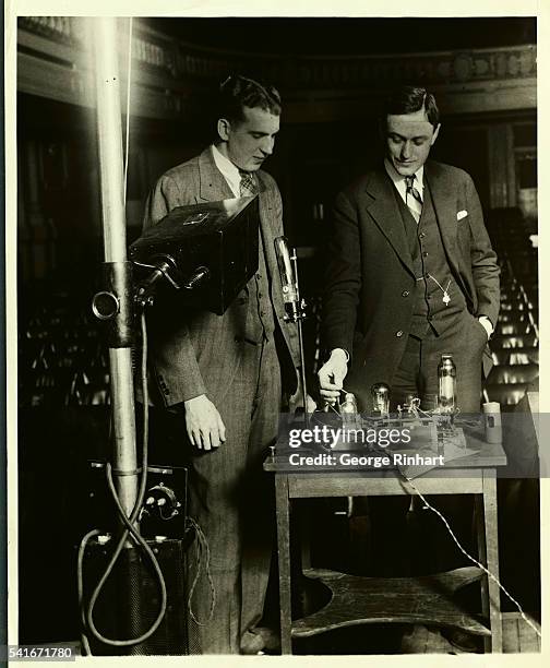 Left to right, Donald E. Henery of the Westinghouse Electric Company and Professor H.H. Sheldon of new York University with a photo electric cell or...