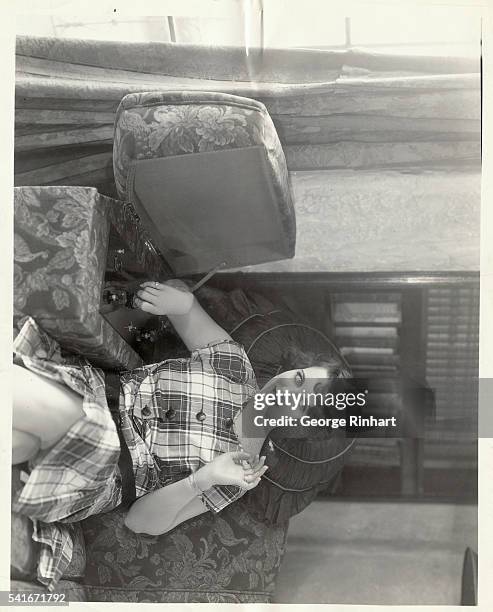 No static here. Gertrude Olmsted, Metro Goldwyn Mayer player believes in comfort with her music. The radio in her new beach home in Santa Monica is...