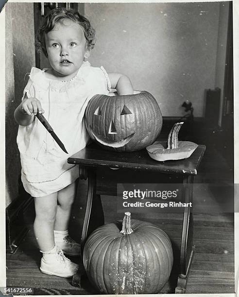 Barbara Lighthall is going to keep just a step ahead of the other "kids" and has her pumpkin all ready for Halloween.