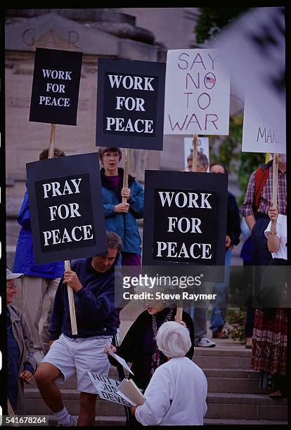protesting impending iraq war - impending stock pictures, royalty-free photos & images