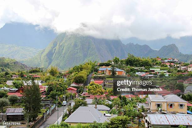 overlooking hell-bourg and view on piton d'anchaing in the middle of cirque de salazie - réunion foto e immagini stock