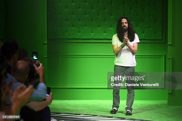 Designer Alessandro Michele aknowledge the applause of the public after the Gucci show during Milan Men's Fashion Week SS17 on June 20, 2016 in...