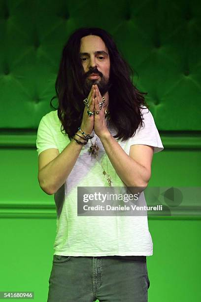 Designer Alessandro Michele aknowledge the applause of the public after the Gucci show during Milan Men's Fashion Week SS17 on June 20, 2016 in...