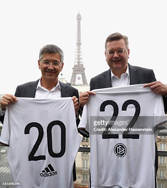 Herbert Hainer , CEO of adidas group poses with Reinhard Grindel, president of Deutscher Fussball Bund DFB during a DFB and adidas press conference...