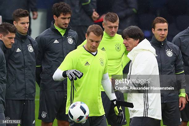 Joachim Loew , head coach of the German national team talks to his players prior to a team Germany training session ahead of the UEFA EURO 2016 Group...