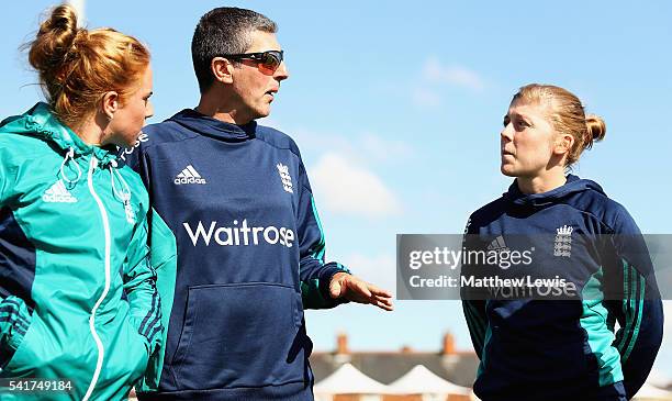 Mark Robinson, Head Coach of England talks to Heather Knight, captain of England during the 1st Royal London ODI match between England Women and...