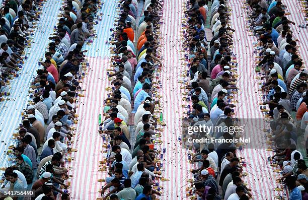 Muslims break their fast with iftar during the holy month of Ramadan on June 20, 2016 in Dubai, United Arab Emirates. Muslim men and women across the...