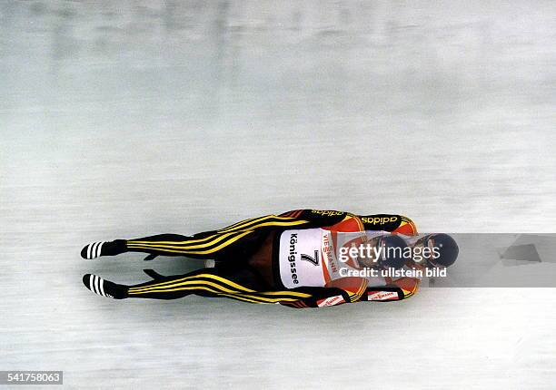 Sportler, Rennrodeln DRodel Weltcup am Königssee:- zusammen mit seinem Partner JanBehrendt auf dem Doppelsitzer inAktion- Dezember 1996