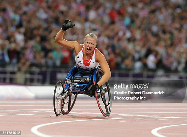Hannah Cockroft of Great Britain celebrates her victory in the women's 200 meters T34 at Olympic Stadium for her second gold medal of the Paralympics.
