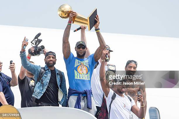 Kyrie Irving, LeBron James, Tristan Thompson, Kevin Love and J.R. Smith of the Cleveland Cavaliers return to Cleveland after wining the NBA...