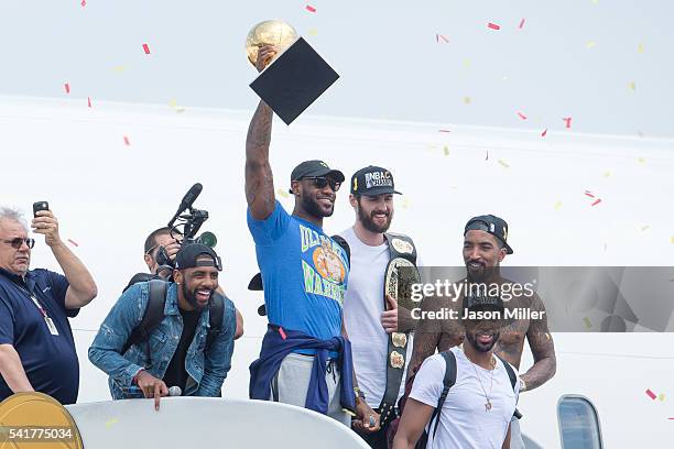 Kyrie Irving, LeBron James, Tristan Thompson, Kevin Love and J.R. Smith of the Cleveland Cavaliers return to Cleveland after wining the NBA...