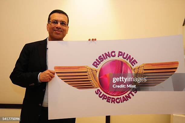 Sanjiv Goenka, Chairman of RP Sanijv Goenka Group and owner of Pune IPL team, holding logo of Rising Pune Supergiants on January 18, 2016 in Kolkata,...