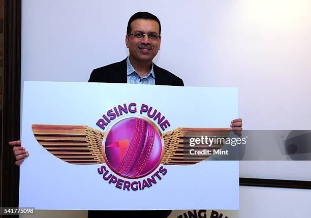 Sanjiv Goenka, Chairman of RP Sanijv Goenka Group and owner of Pune IPL team, holding logo of Rising Pune Supergiants on January 18, 2016 in Kolkata,...