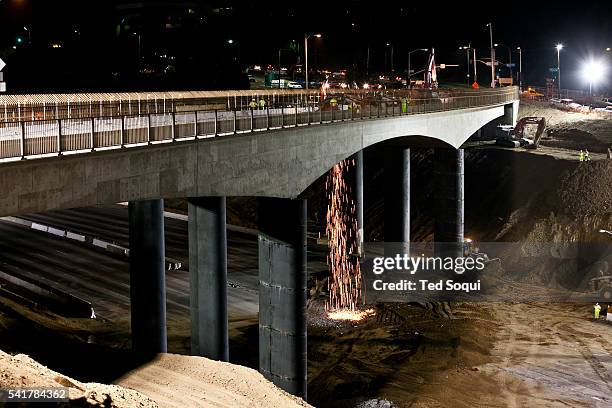 The two day 10 mile closure of the 405 freeway in L.A. Known as Carmageddon begins. Demolition of the Mulholland Drive bridge begins,