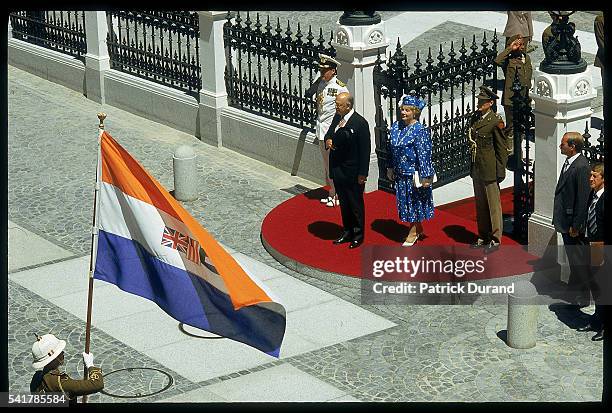 South African President Pieter Willem Botha and his wife Elize stand in front of the Parliament building in Cape Town during the 1987 state opening...