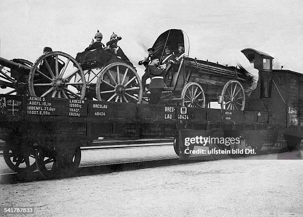 German Empire Kingdom Prussia - Schlesien Provinz - Breslau: German Army - Drinking Soldiers and cannons during a transport on a open railway car -...