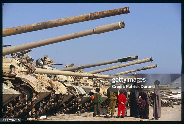 Destroyed tanks on display at the International Fair two years after the Gulf War.