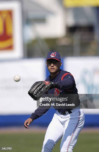 Alex Escobar of the Cleveland Indians fields the ball during the spring training game against the Minnesota Twins at Chain of Lakes Park in Winter...