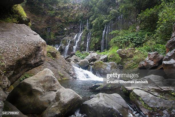 cascades at the grand galet waterfall, langevin river valley, reunion island - galet stock pictures, royalty-free photos & images