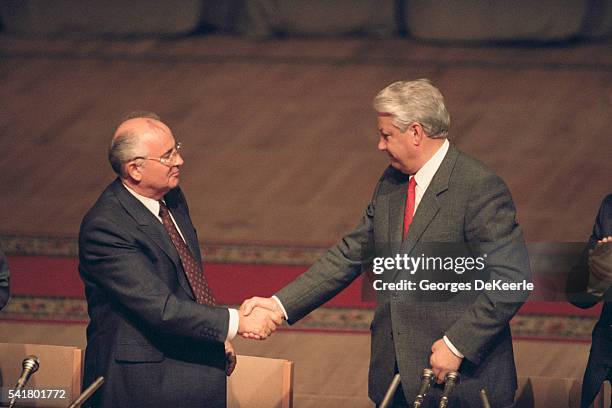 Following attempted coup, President of the Soviet Union Mikhail Gorbachev signs a treaty at Parliament, prohibiting the Communist Party on the...