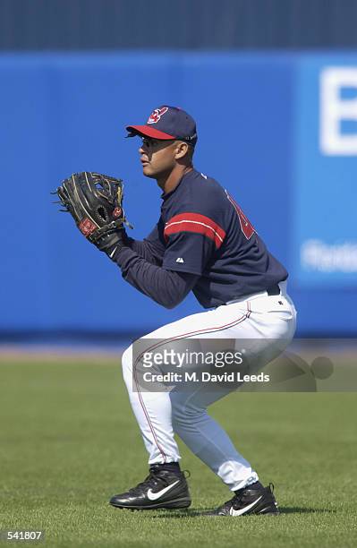 Alex Escobar of the Cleveland Indians fields the ball during the spring training game against the Minnesota Twins at Chain of Lakes Park in Winter...