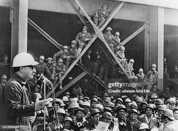 Chilean politician and president . Allende giving a speech before a group of miners, 18 May 1973