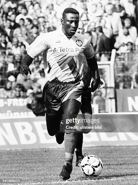 1966Sportler, Fußball, Ghana- Spielszene, im Trikot vonEintracht Frankfurt- 00.09.1993