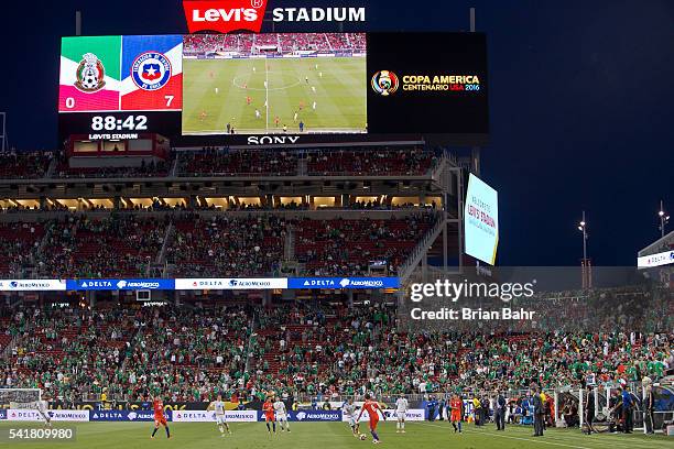 The scoreboard shows the final score near the end of a Quarterfinal match between Mexico and Chile at Levi's Stadium as part of Copa America...