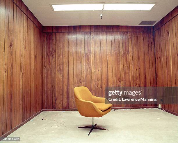 lone chair in bare room - wood paneling stock pictures, royalty-free photos & images