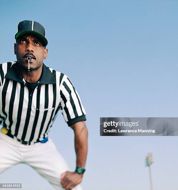 referee watching play in progress - referee uniform stock pictures, royalty-free photos & images