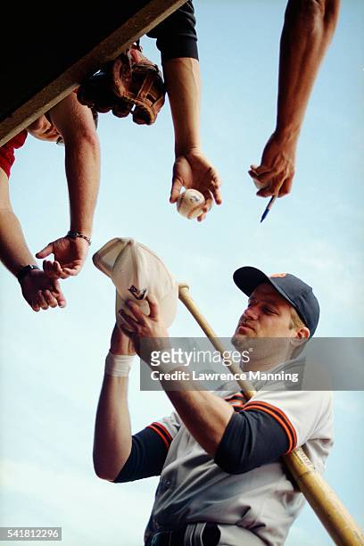 baseball player signing memorabilia - baseball fans stock pictures, royalty-free photos & images