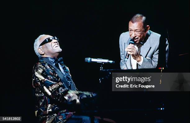 American singer and songwriter Ray Charles and French singer and songwriter Henri Salvador sing a duet at the 11th "Victoires de la Musique" award...