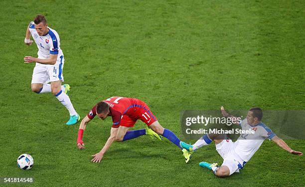 Jamie Vardy of England is fouled by Viktor Pecovsky of Slovakia resulting in an yellow card during the UEFA EURO 2016 Group B match between Slovakia...