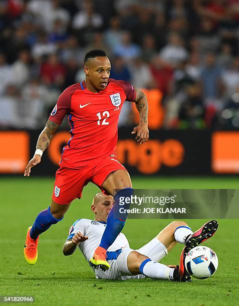 England's defender Nathaniel Clyne takes the ball away from Slovakia's midfielder Vladimir Weiss during the Euro 2016 group B football match between...
