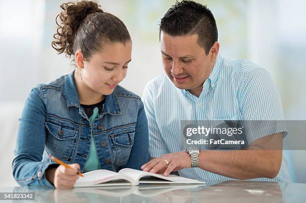 Parents Getting Help Parent High Schooler Photos and Premium High Res Pictures - Getty Images