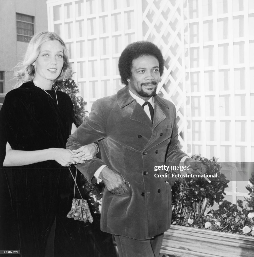 Quincy Jones Arrives With Date