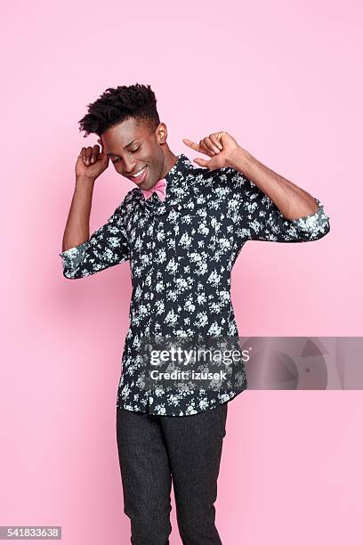 successful afro american young man - colour background cool portrait photography joy stock pictures, royalty-free photos & images