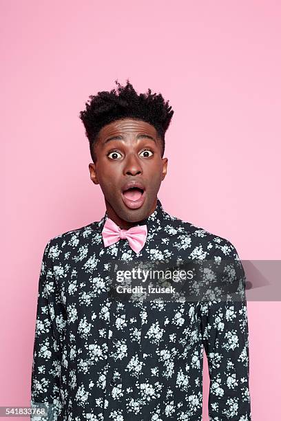 surprised afro american young man - ecstatic face stock pictures, royalty-free photos & images