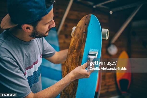 busy day in a skateboard shop - skateboard shop stock pictures, royalty-free photos & images