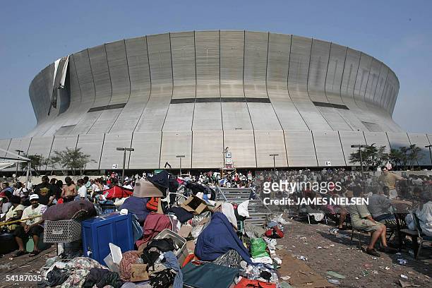New Orleans, UNITED STATES: Hurricane Katrina survivors wait outside the Superdome and Convention Center in New Orleans 02 September, 2005. The New...