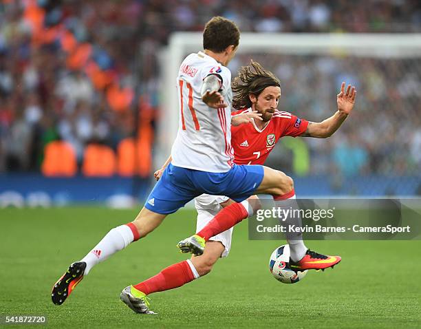 Wales's Joe Allen under pressure from Russia's Pavel Mamayev during the UEFA Euro 2016 Group B match between Russia v Wales at Stadium de Toulouse on...