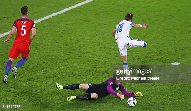 Joe Hart of England and Dusan Svento of Slovakia compete for the ball during the UEFA EURO 2016 Group B match between Slovakia and England at Stade...