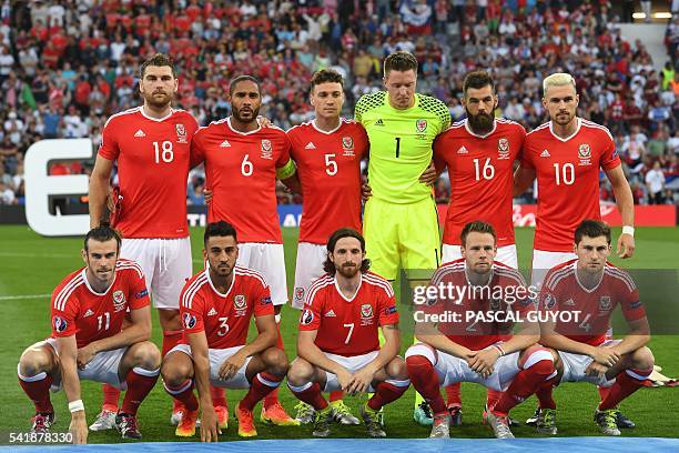 Wales' forward Sam Vokes, Wales' defender Ashley Williams, Wales' defender James Chester, Wales' goalkeeper Wayne Hennessey, Wales' midfielder Joe...